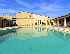 The large swimming pool 18 by 6 meters of the hotel La Bergerie